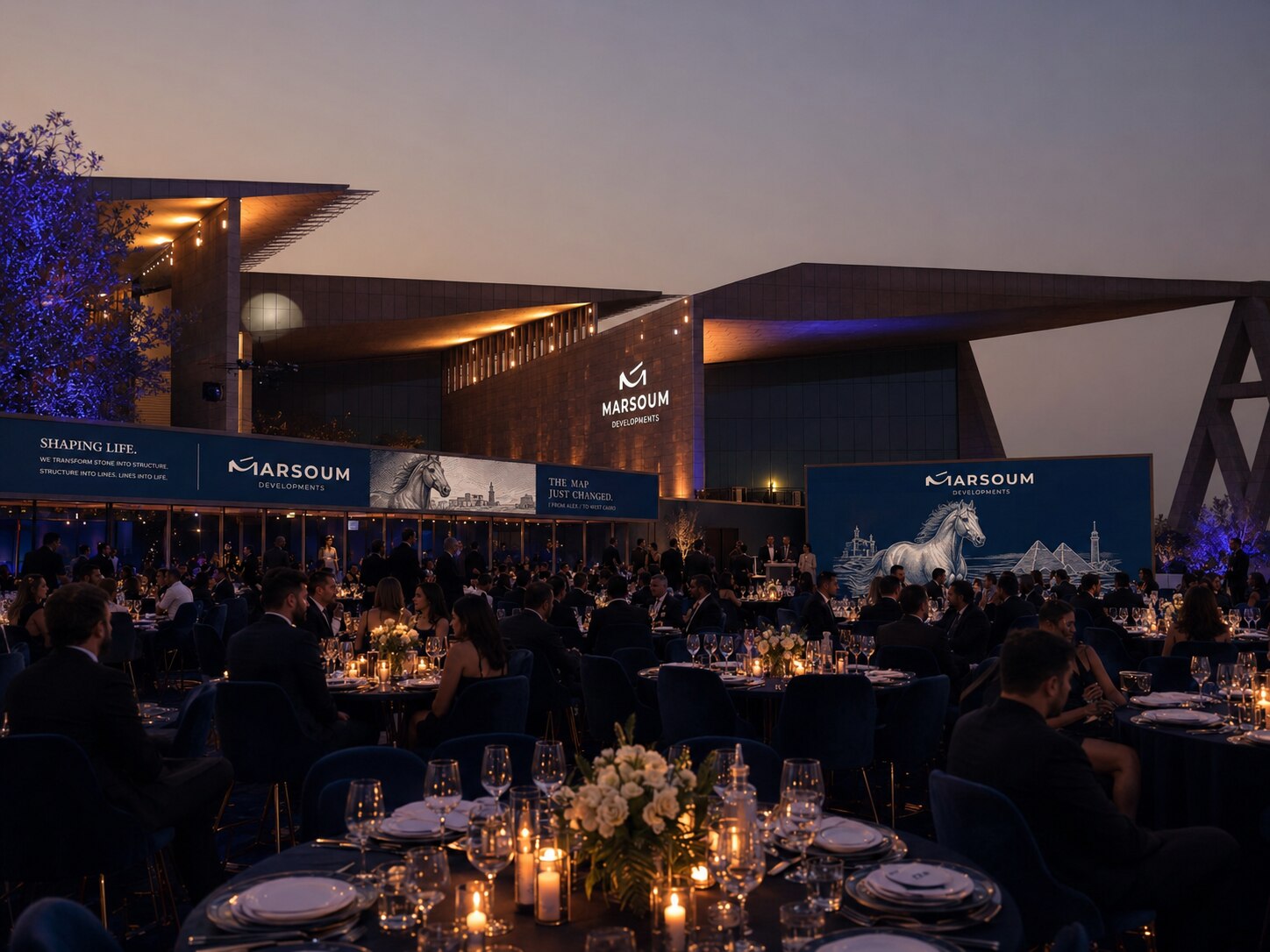 Full branded dining floor at the Grand Egyptian Museum — Marsoum Developments event at dusk